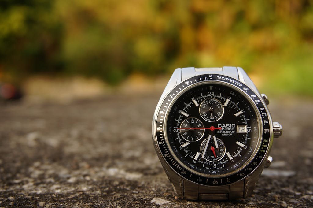 Detailed macro shot of a Casio Edifice wristwatch with focus on chronograph dials.